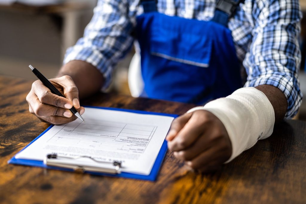 workers compensation injury filling out a form