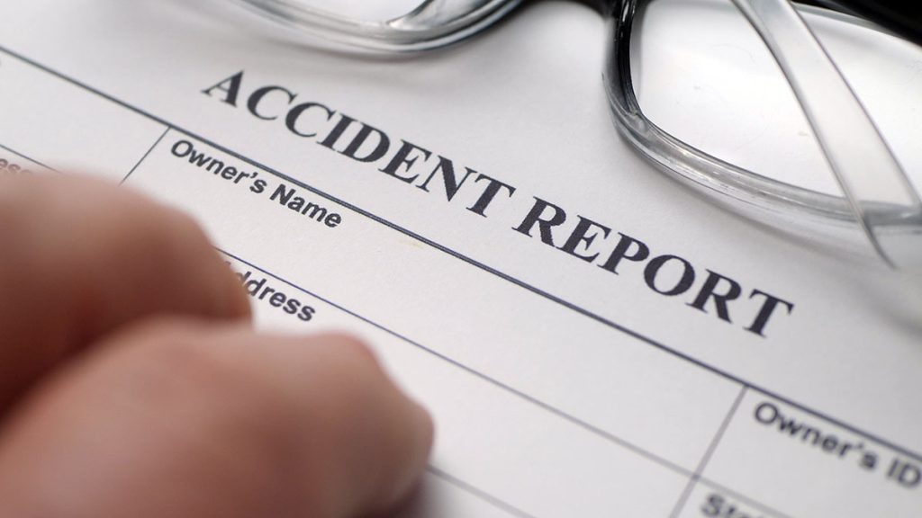 Hand on accident claim documents