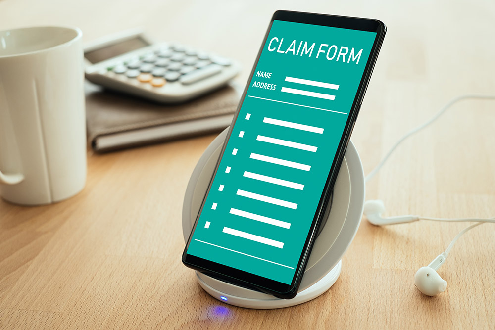 Phone with claim form on the screen