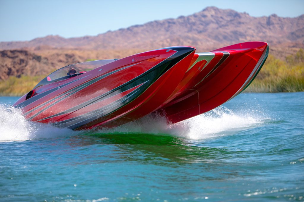 boat going fast on a lake