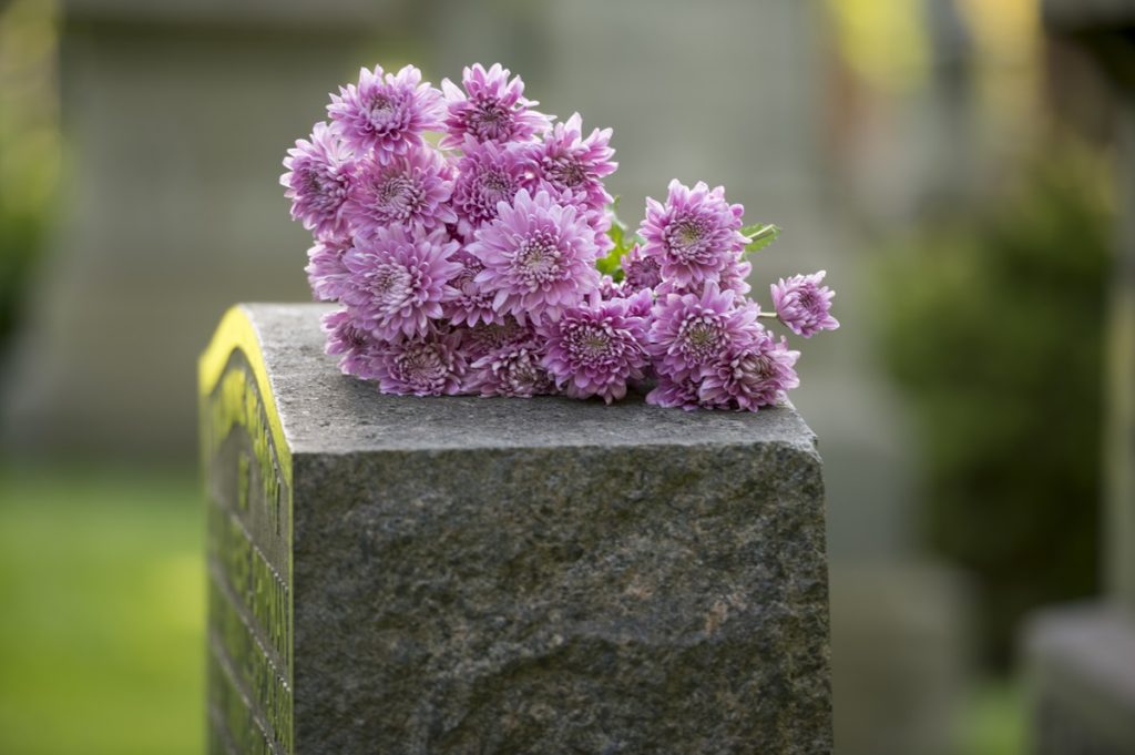 Flowers on a Headstone for Someone in a Wrongful Death