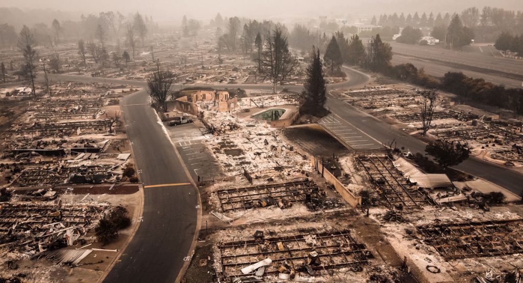 wildfire aftermath of burned down homes